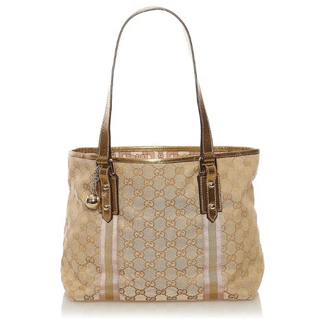 gucci jolie jolicoeur gold|Gucci Gold Original GG Canvas Jolicoeur Tote Large .